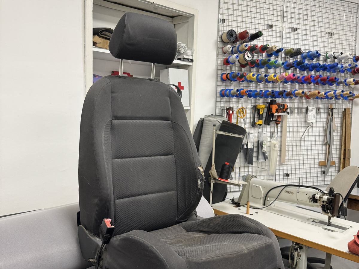 A seat in the workshop, waiting for its new covers